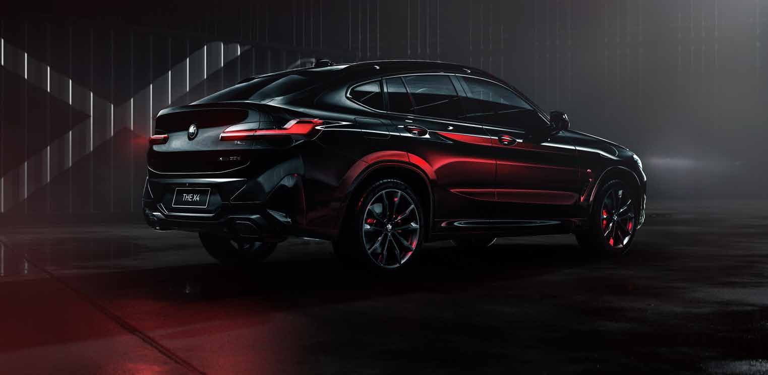 BMW X4 M40i — Coupe-SUV roofline in dramatic light