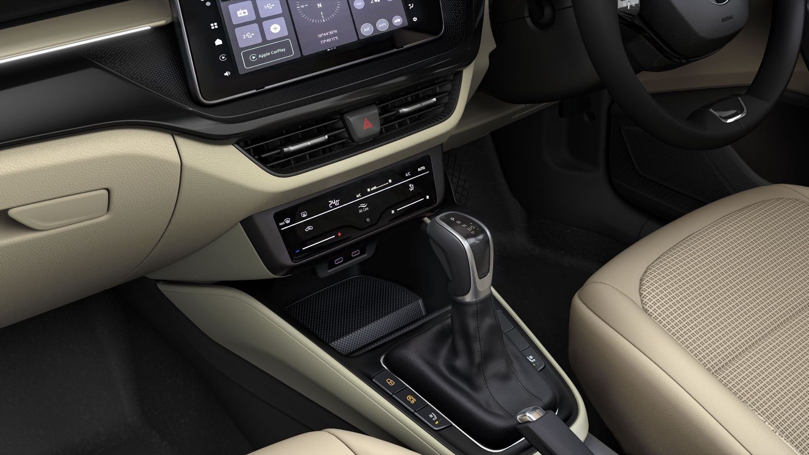 2026 Škoda Slavia interior showing the 25.6 cm touchscreen, Climatronic controls, automatic gear selector and beige upholstery