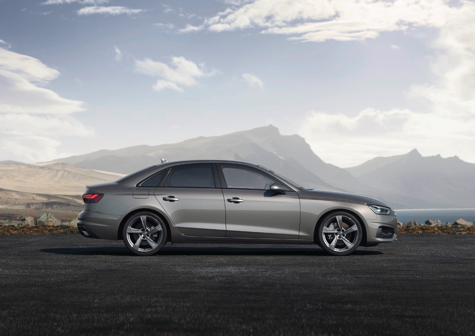 Audi A4 — Side profile with sculpted shoulder line and alloy wheels
