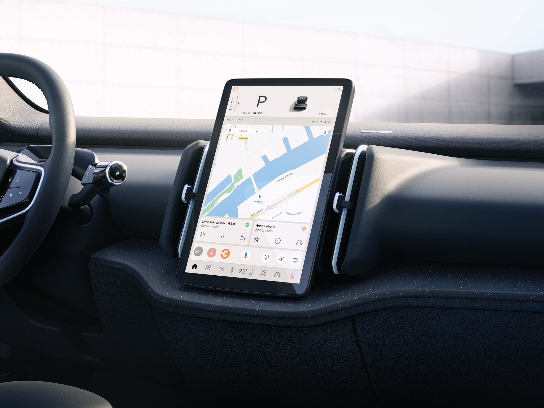 Volvo EX30 — Vertical centre touchscreen displaying the navigation map and media player.