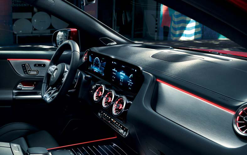 Mercedes-Benz Mercedes-AMG GLA 35 4MATIC — AMG cockpit with red ambient interior lighting and twin widescreen displays