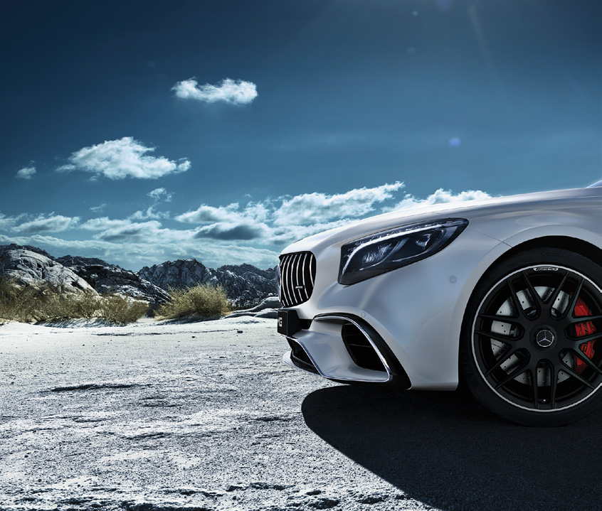 Mercedes-Benz Mercedes-AMG S 63 E Performance — AMG Panamericana grille with vertical fins alongside the LED headlamp, forged wheel and red brake calliper