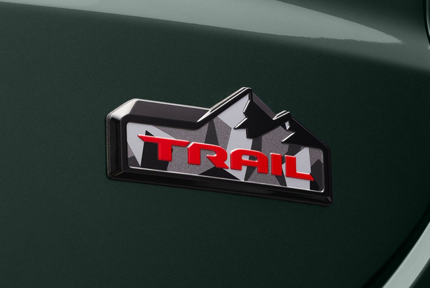Jeep Meridian — Trail Edition badge with a mountain-and-camouflage motif on the bodywork.