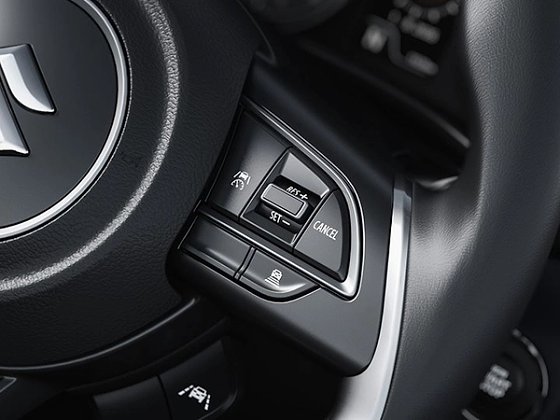 Maruti Suzuki Baleno, Suzuki Safety Sense on Alpha (O): 8 functions including adaptive cruise with curve speed reduction, forward-collision warning, lane-departure prevention and high-beam assist.