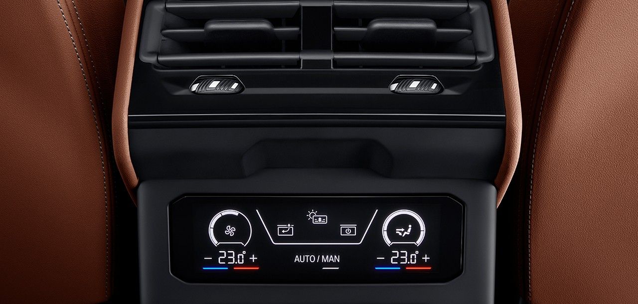 BMW i5 LWB — Rear-cabin climate console with its own temperature and seat controls.