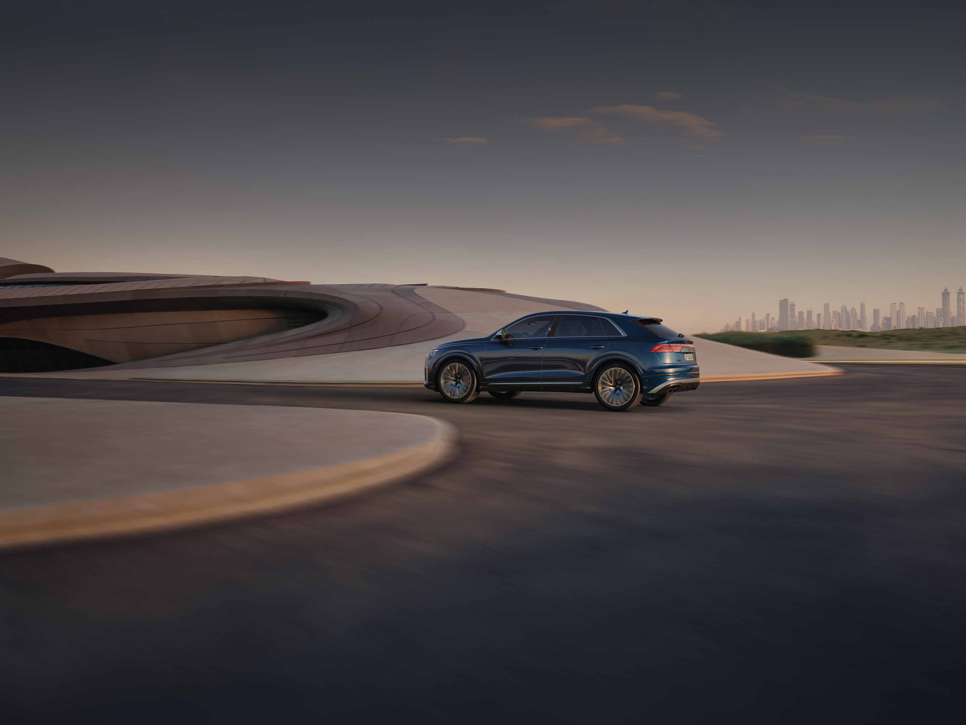 Audi SQ8 — Sloping SUV-coupe roofline seen in profile.