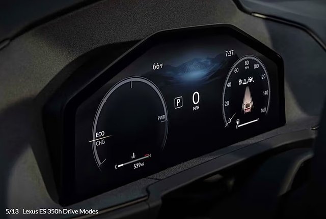 Digital dashboard display showing speedometer, fuel gauge, and drive mode settings at 0 mph.
