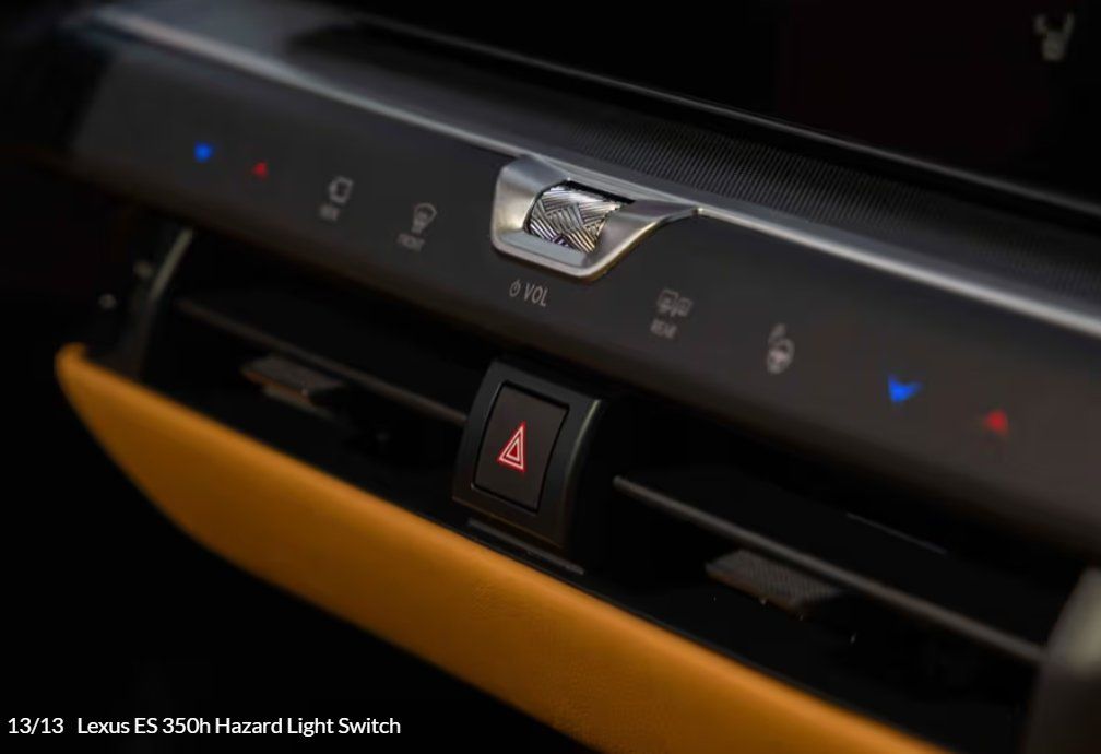Lexus ES 350h dashboard control panel with hazard light switch and indicator lights.