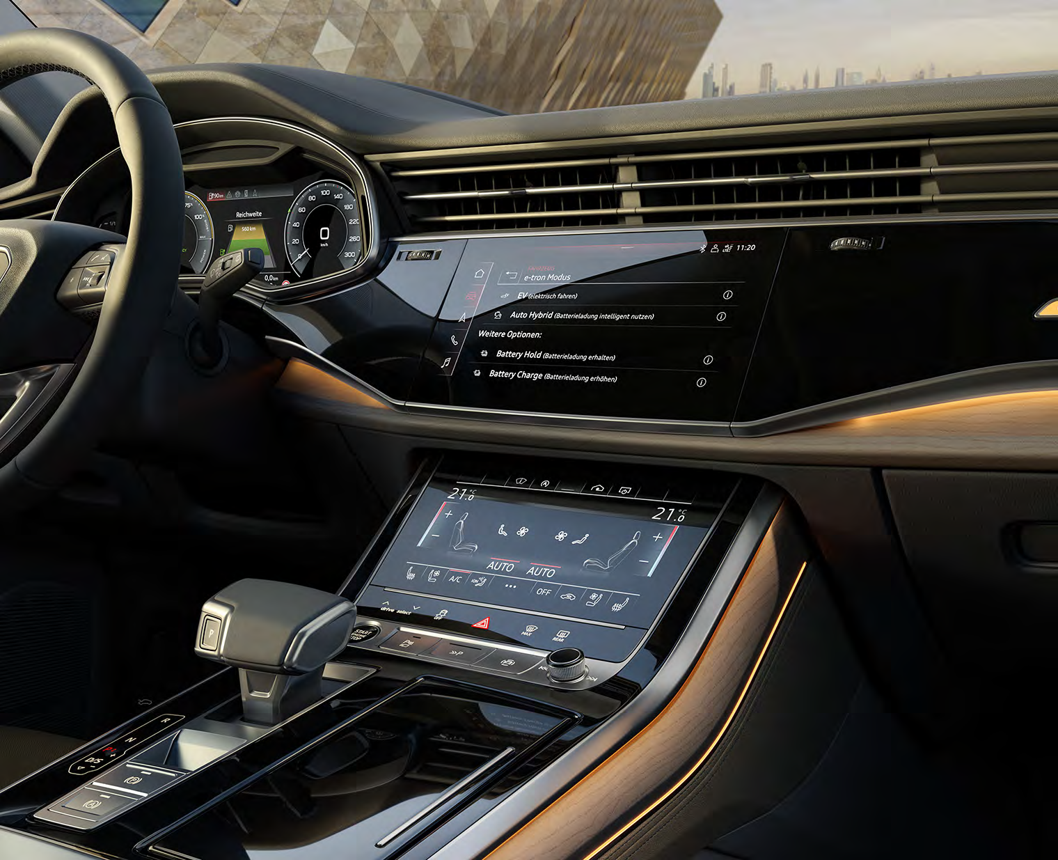Audi Q8 — Dual-screen MMI navigation plus touch display with lower climate panel.