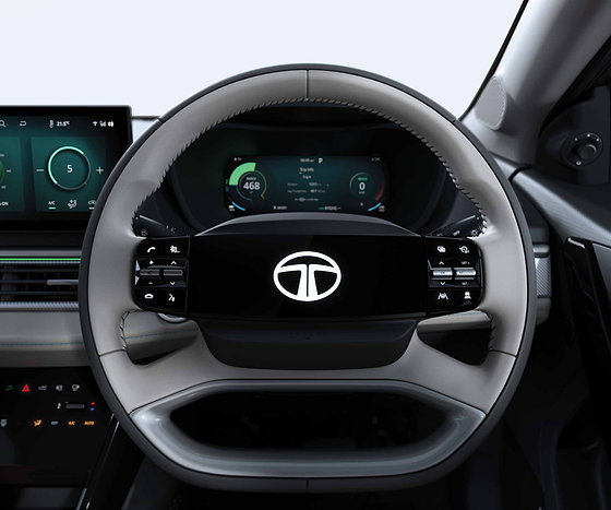 Tata Curvv EV, Smart digital steering wheel with illuminated logo and integrated touch controls