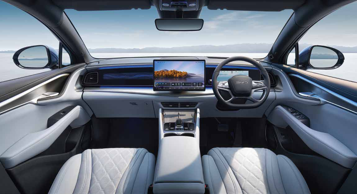 BYD Sealion 7 — Front cabin with quilted white Nappa leather seats and floating centre console.