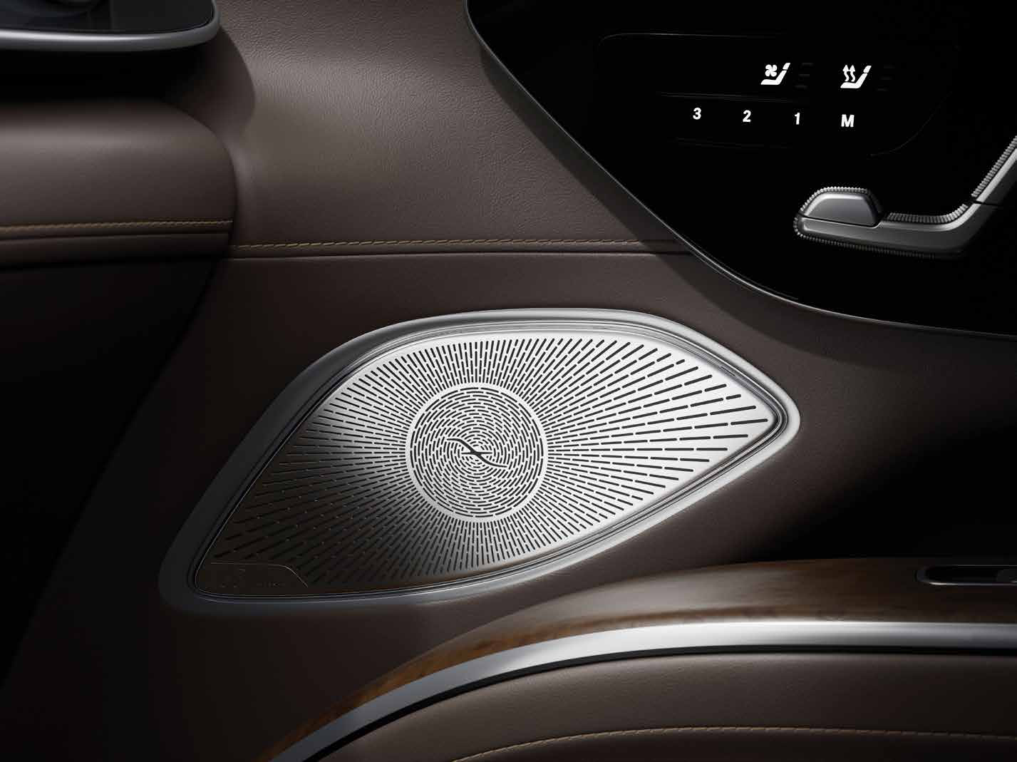 Mercedes-Benz Mercedes-Maybach EQS SUV — Burmester surround-sound speaker beside the seat massage and climate controls