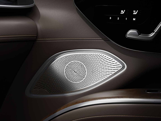 Mercedes-Benz Mercedes-Maybach EQS SUV, Burmester surround-sound speaker beside the seat massage and climate controls