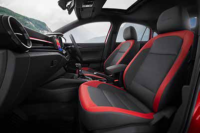 Skoda Škoda Slavia (2022–2026), Monte Carlo ventilated front seats in black leatherette with red inserts.