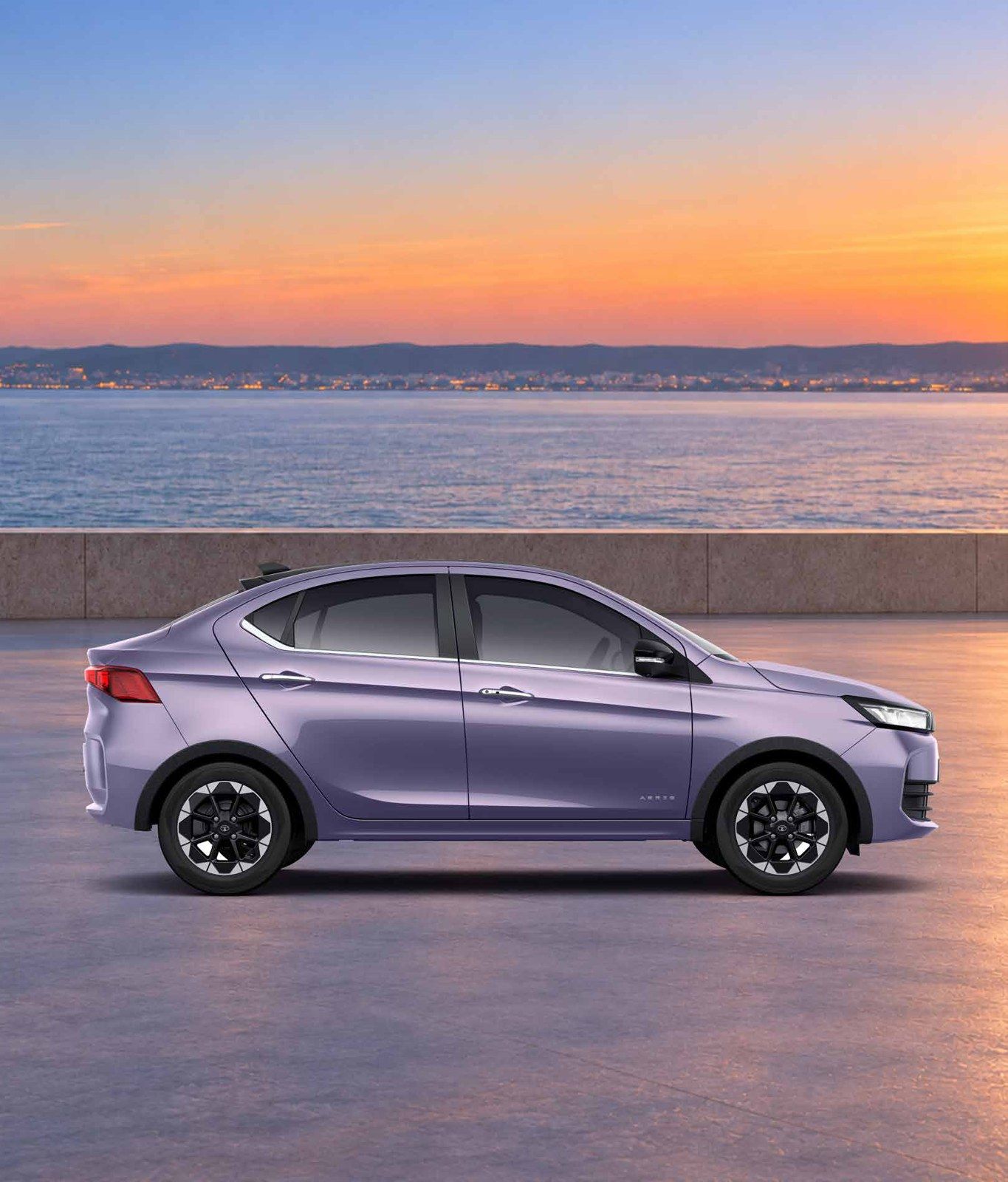 Tata Aeris, Sub-4-metre three-box profile with a raked tail and body-coloured handles