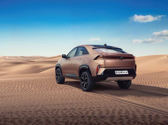 Tata Curvv, Connected LED tail lamps run the full width of the tailgate, paired with sequential turn indicators.