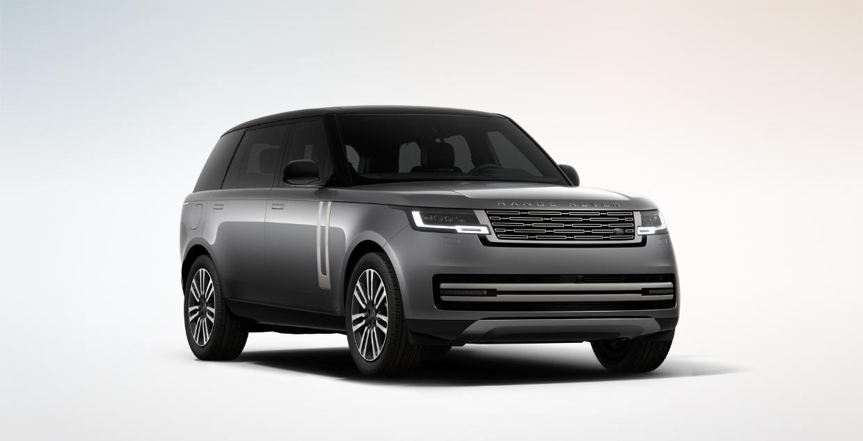 Land Rover Range Rover — Front three-quarter view showing the signature Range Rover grille and hidden-until-lit LED headlights, in Eiger Grey with a contrast black roof.