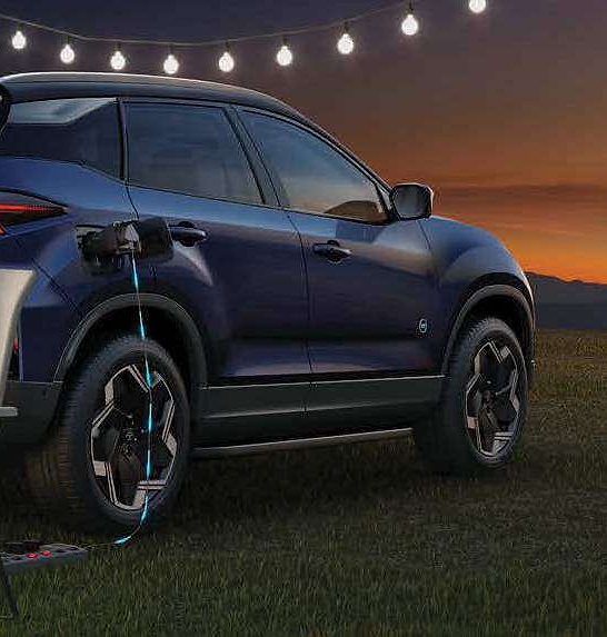 Tata Harrier EV, Vehicle-to-Load (V2L) technology powers appliances from the charging port, turning the SUV into a mobile power hub