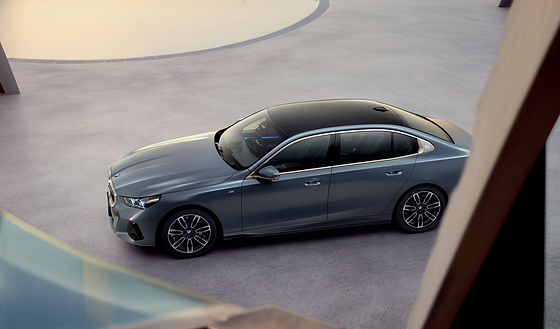 BMW 5 Series , Full-length panoramic glass roof and the embossed '5' on the C-pillar, viewed from above