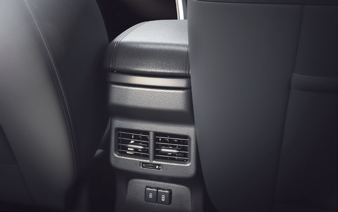 Maruti Suzuki Brezza — Rear AC vents with Type-A and Type-C fast-charging USB ports.
