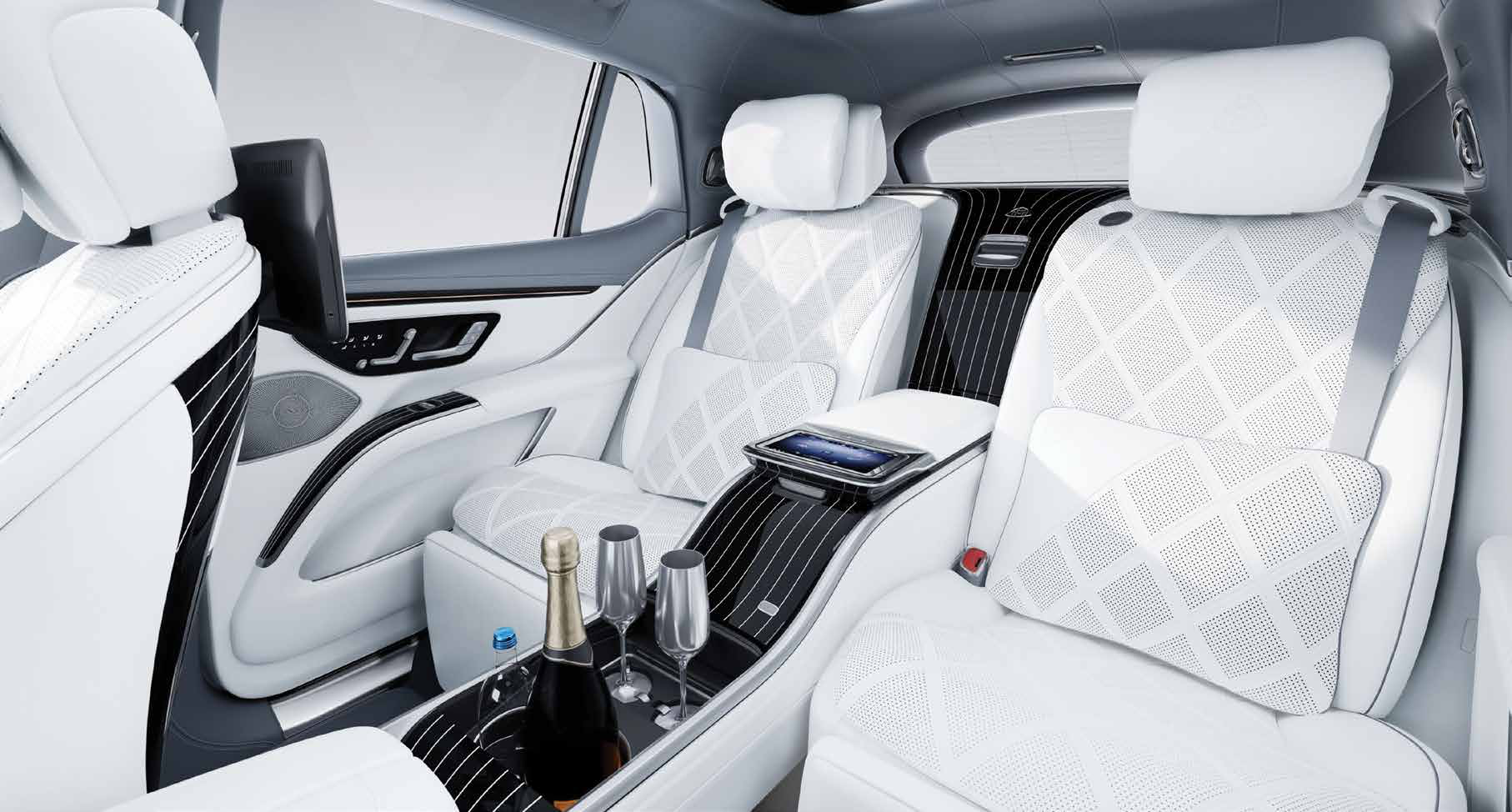 Mercedes-Benz Mercedes-Maybach EQS SUV — Rear centre console with refrigerated compartment, champagne flutes and tablet control