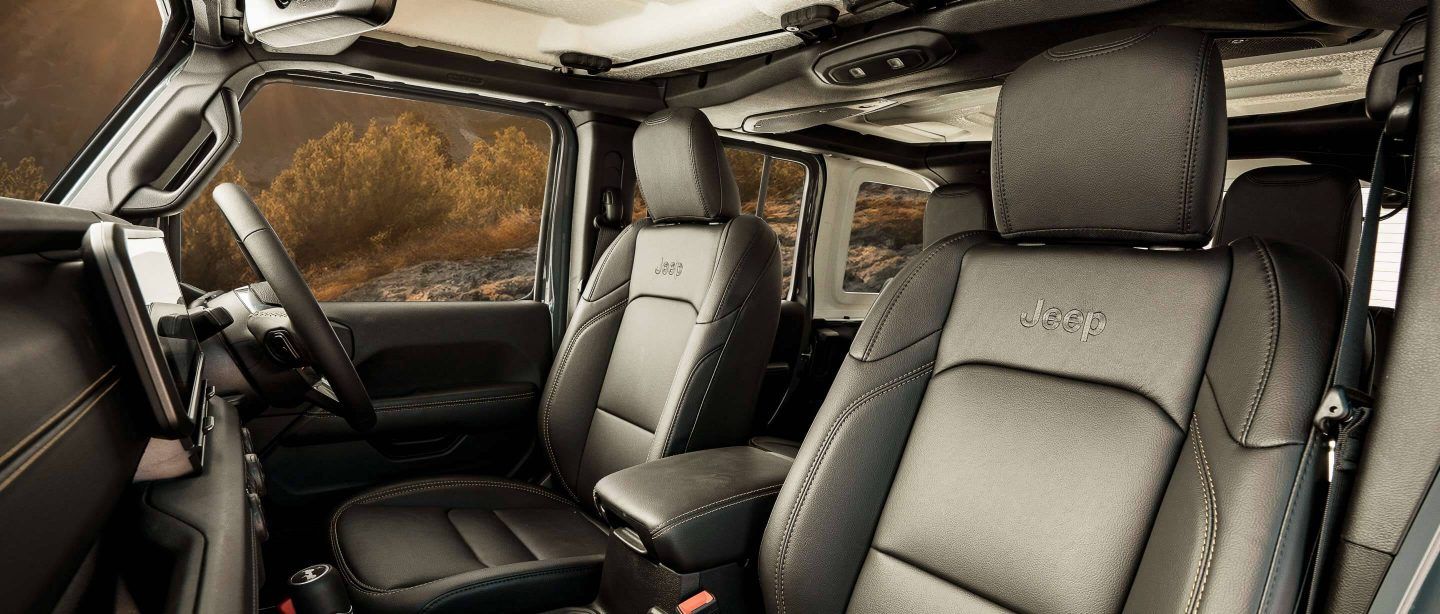 Jeep Wrangler — Front cabin with leather-trimmed seats, Jeep-embossed headrests and soft-touch dashboard
