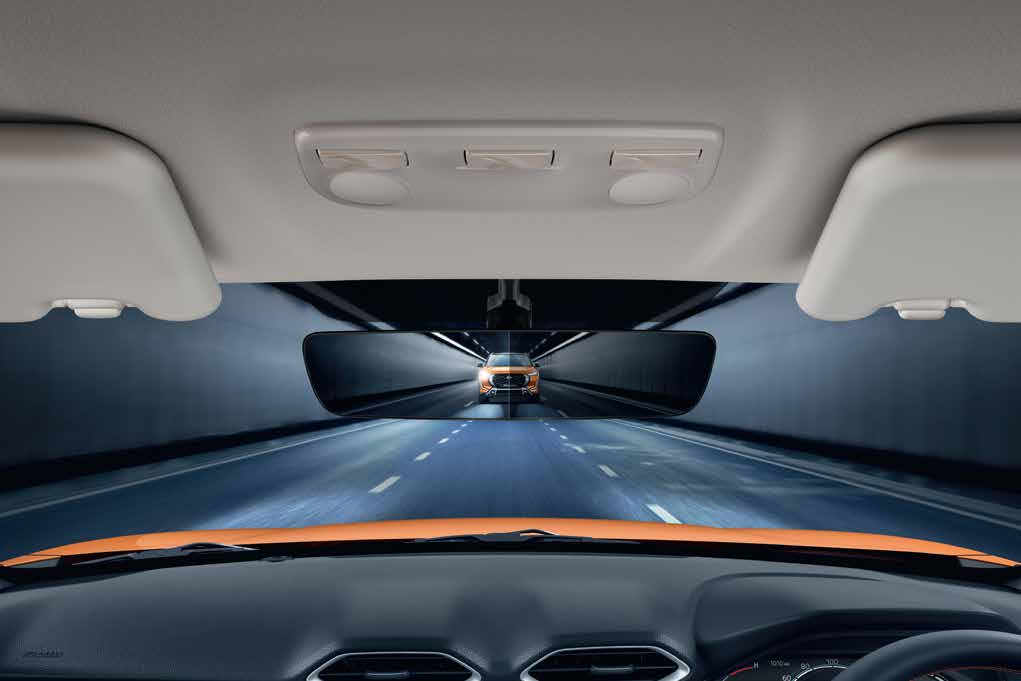 Nissan Magnite — Auto-dimming bezel-less inside rear-view mirror cutting headlight glare.