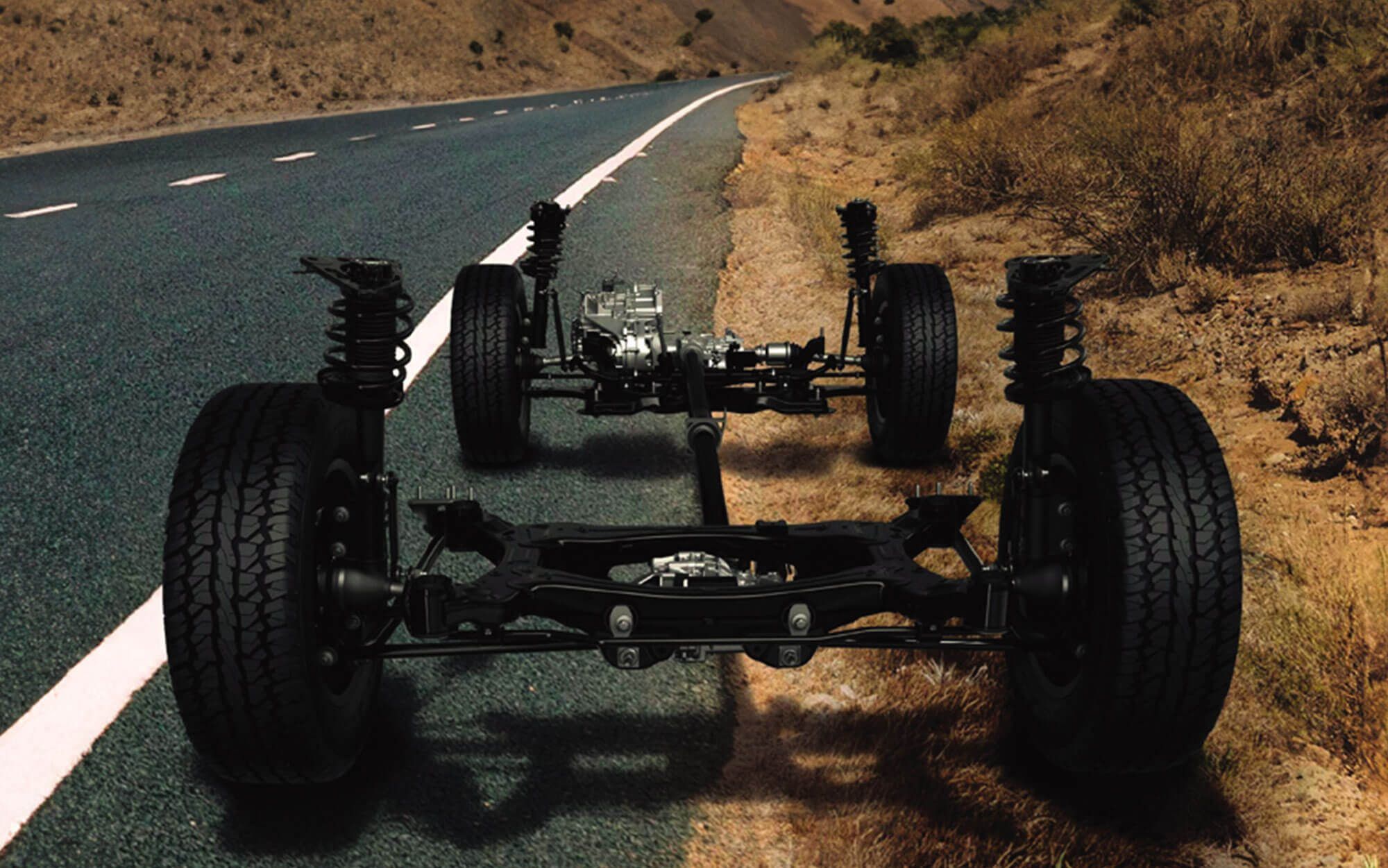 Jeep Meridian — Underbody view of the four-wheel-drive layout with driveshafts, coil-spring suspension and all-season tyres.
