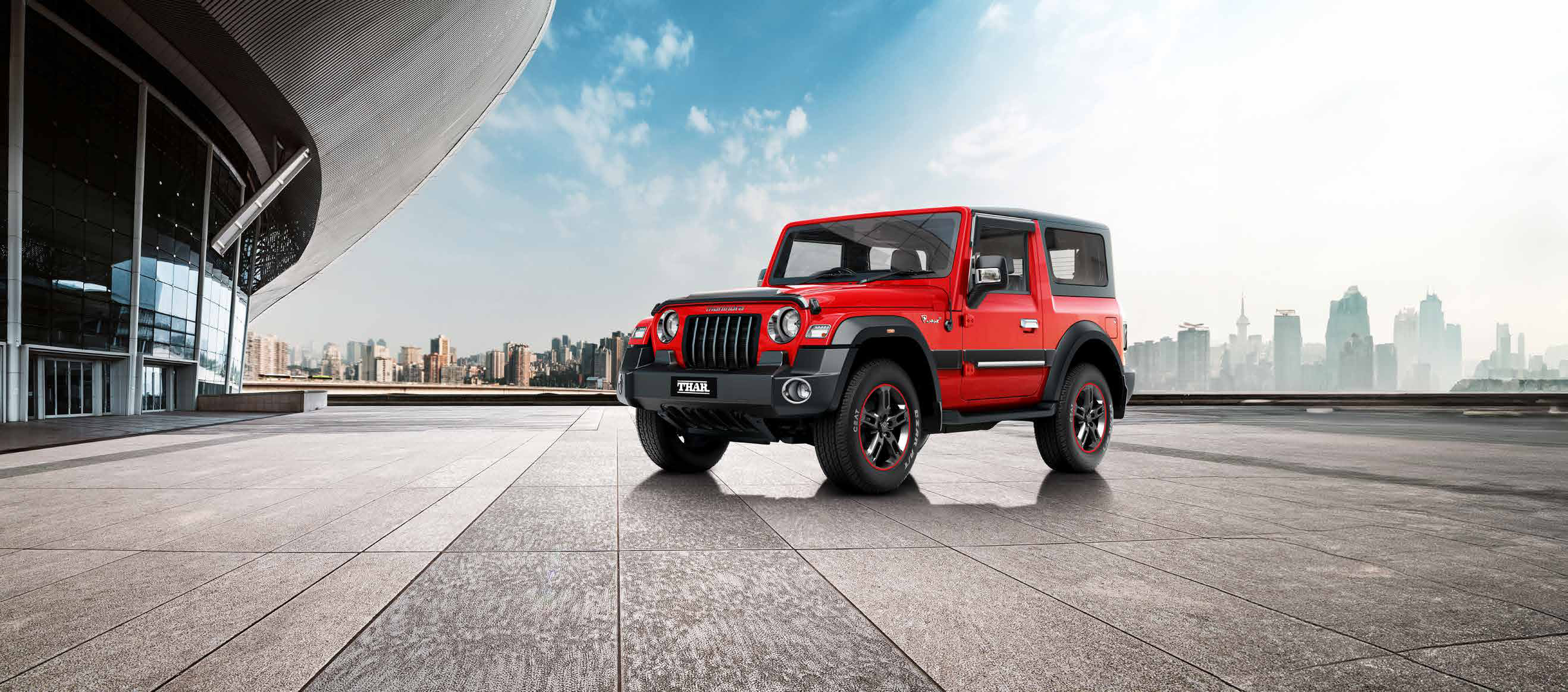 Mahindra Thar — Personalised with genuine Mahindra accessories, from styling add-ons to red-accented alloys