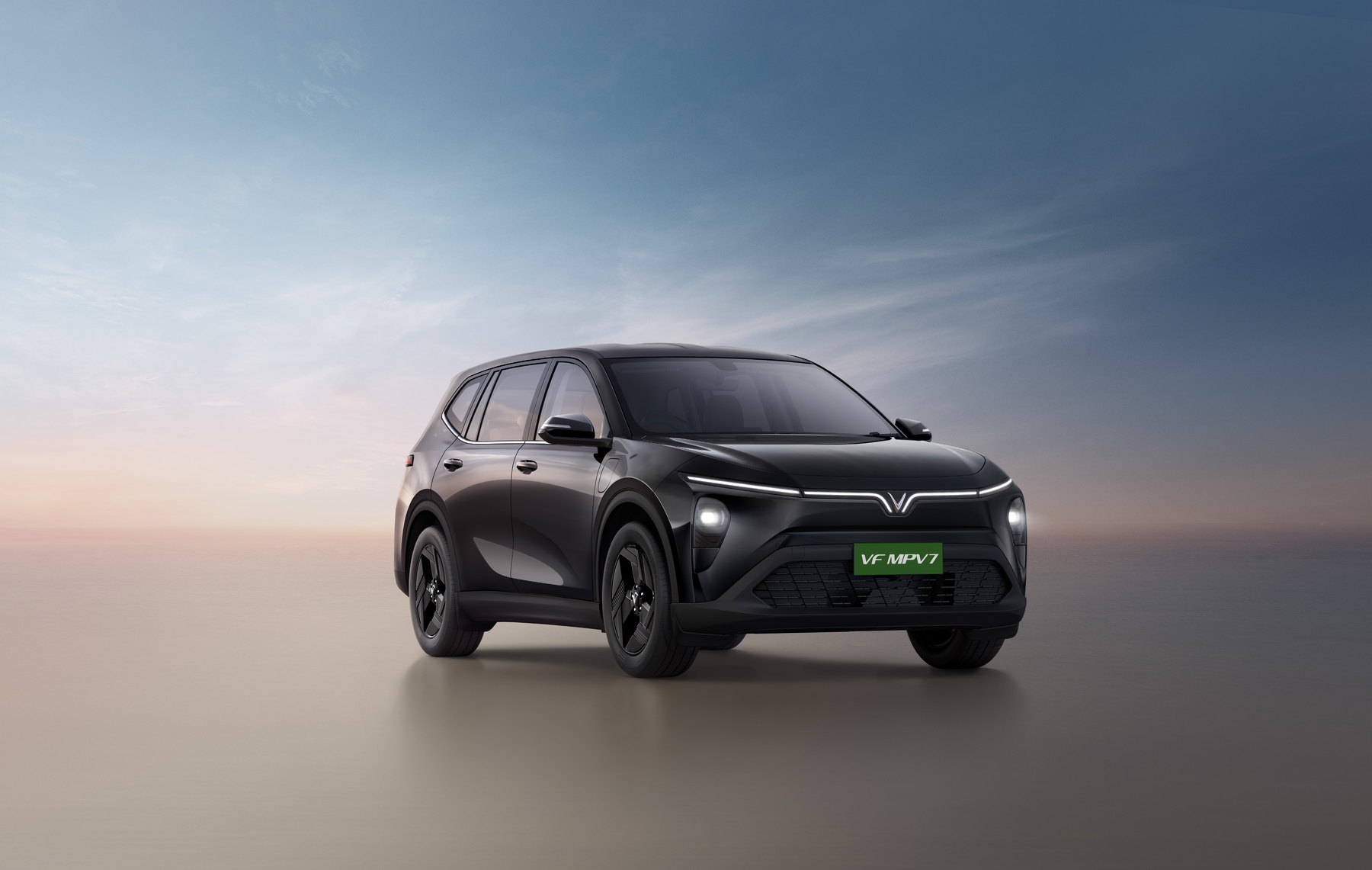 VinFast VF MPV 7 — Bold front three-quarter stance of the VF MPV7 electric MPV