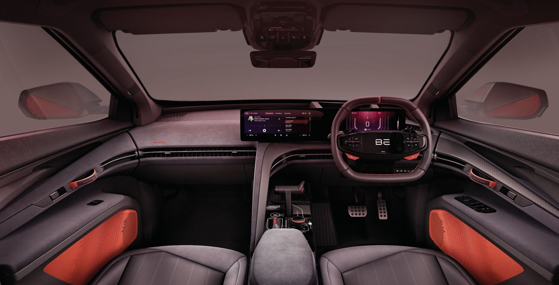 Mahindra BE 6 — Formula E dual-screen race-ready cockpit with Firestorm Orange interior accents