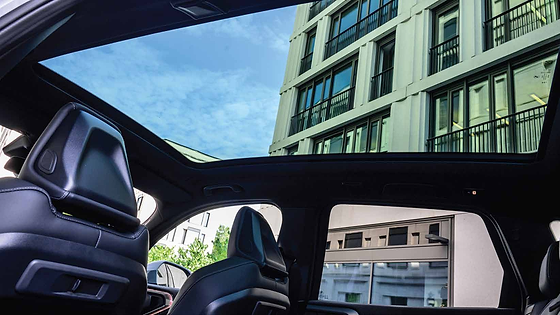 BMW X3, Panoramic glass roof stretching edge to edge over the cabin