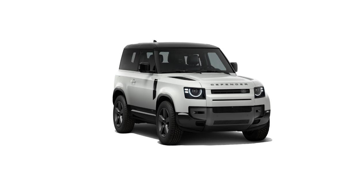 Land Rover Defender — Defender 90 in Fuji White with a black contrast roof, showing the signature grille, round LED headlights and DEFENDER bonnet lettering.