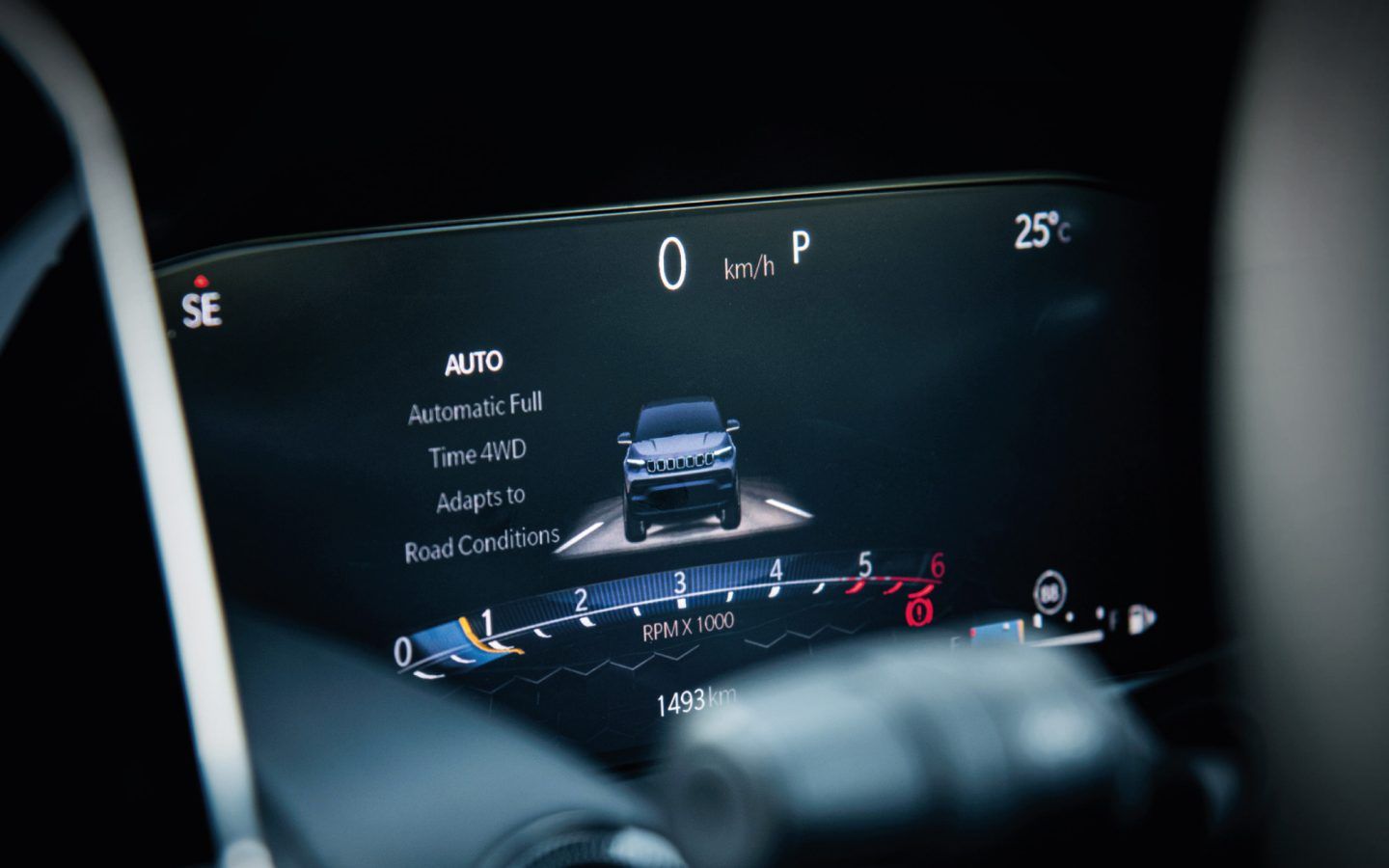 Jeep Compass — Fully digital instrument cluster displaying the full-time 4WD drive graphic and vehicle info.