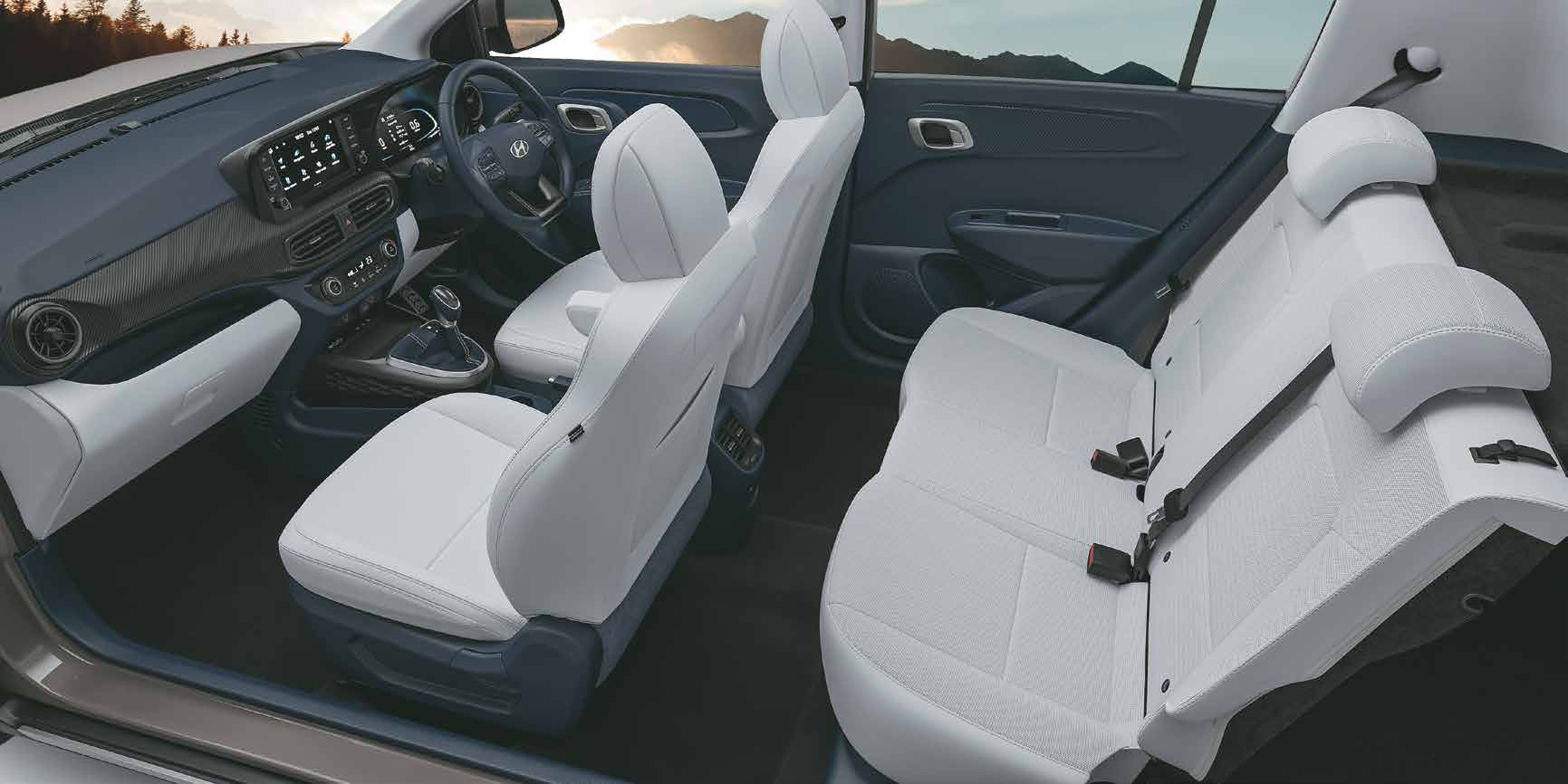 Hyundai Exter — Dual-tone navy & grey cabin with semi-fabric seat upholstery