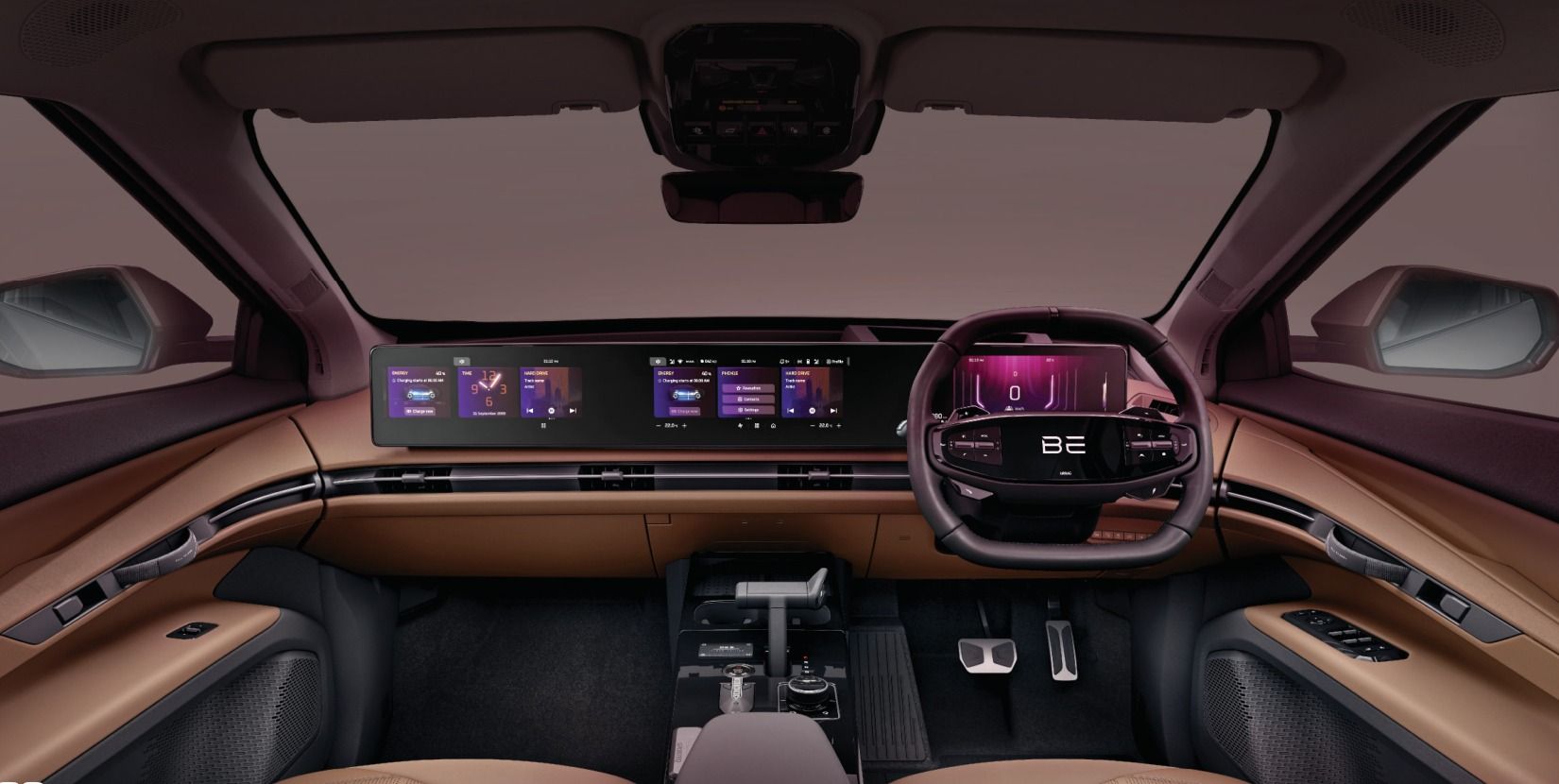 Mahindra BE 6 — Coast-to-Coast triple HD display with Racing Tan leatherette and the straight instrument panel