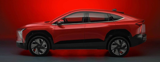 Mahindra XEV 9e, Coupe roofline side profile with black cladding and aerodynamic alloy wheels
