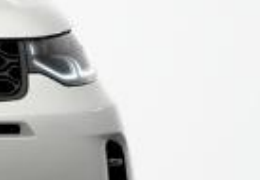 Land Rover Discovery Sport — LED headlight carrying the signature Discovery LED daytime-running-light graphic.