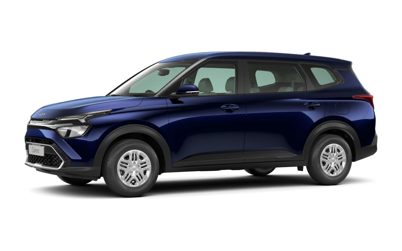 Kia Carens, Full side profile, where the seven-seat proportions and roof rails read clearly