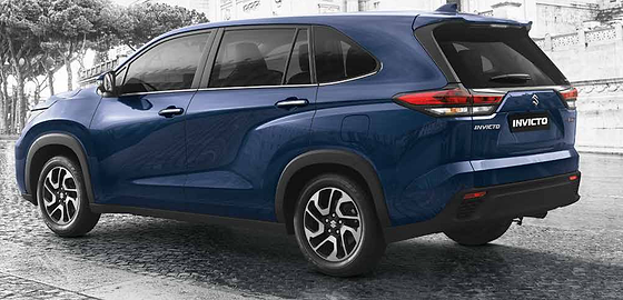 Maruti Suzuki Invicto, Rear three-quarter profile with NEXTre signature LED tail lamps and a chrome tailgate insert.