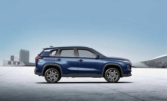 Maruti Suzuki Grand Vitara, Side profile with precision-cut dual-tone alloy wheels and a floating-roof design.
