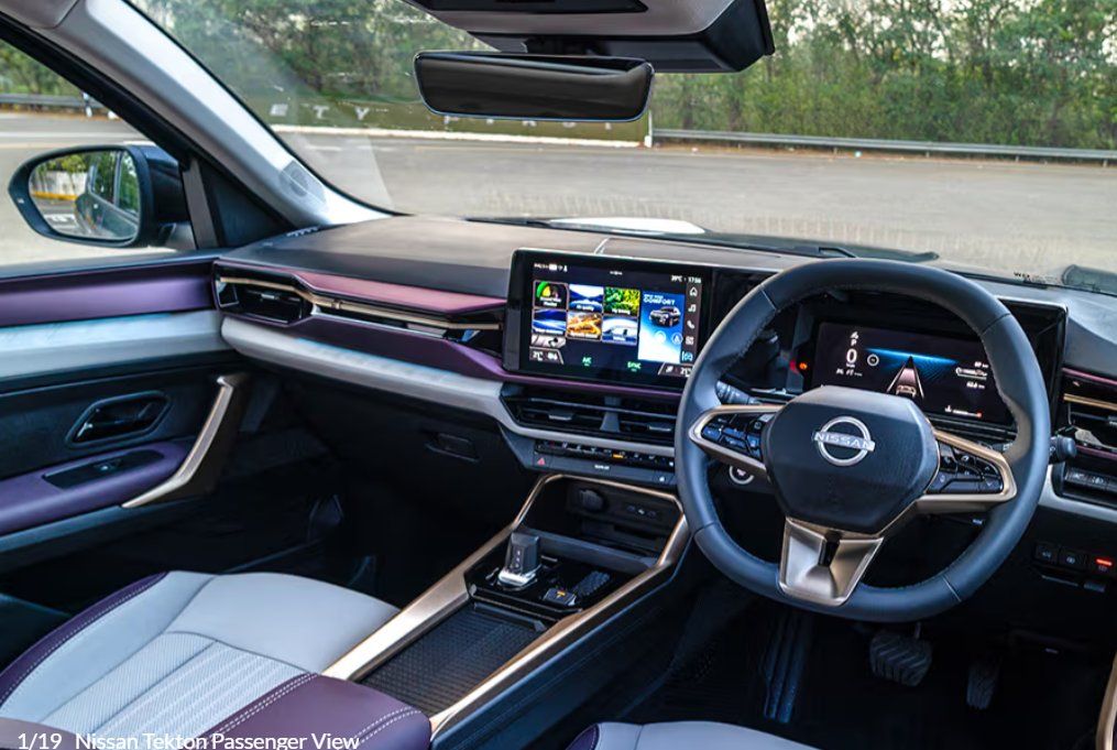 Modern car interior with digital dashboard, touchscreen display, and steering wheel.