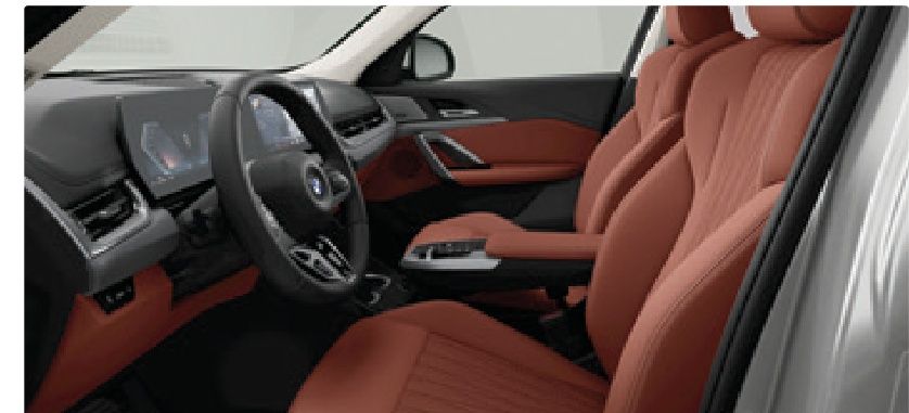 BMW X1 LWB — Veganza perforated Castanea upholstery with dual curved BMW OS 9 displays