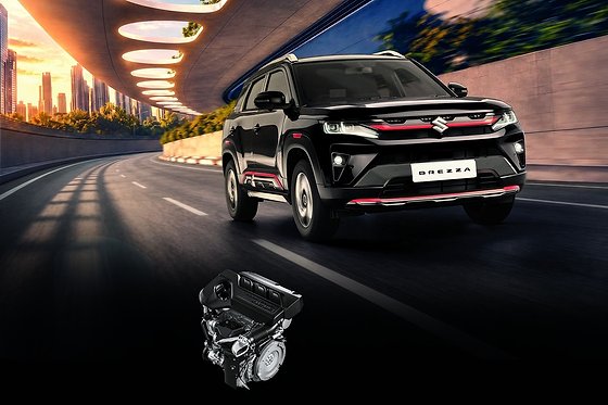 Maruti Suzuki Brezza, Bold SUV stance with dark chrome detailing and red skid-plate accents.