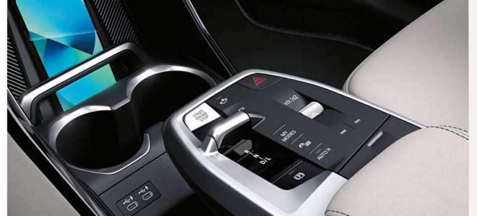 BMW iX1 — Wireless smartphone charging tray in the centre console