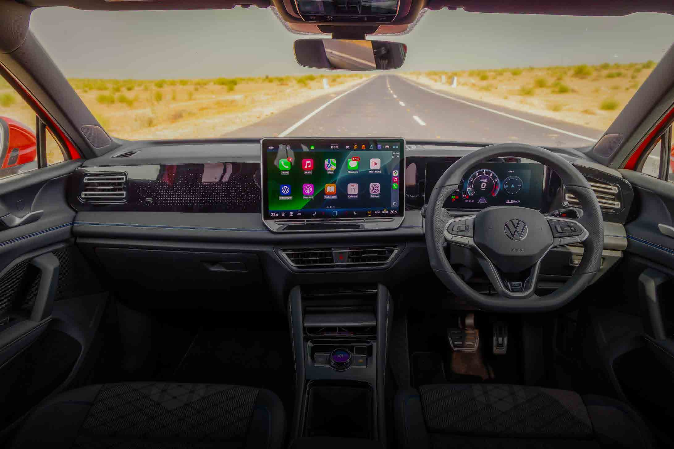 Volkswagen Tiguan R-Line — Driver-focused dashboard with configurable interior ambient lighting and a dual-screen layout