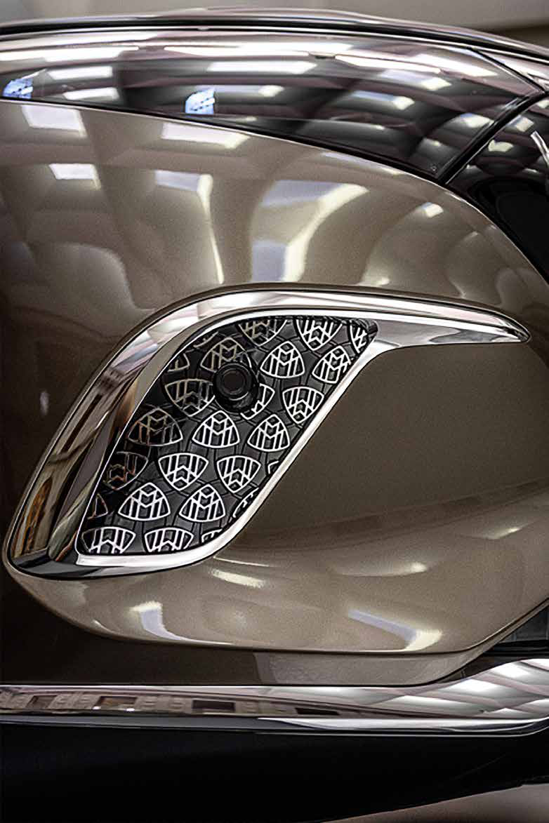 Mercedes-Benz Mercedes-Maybach EQS SUV — Chrome side louver etched with the Maybach double-M monogram