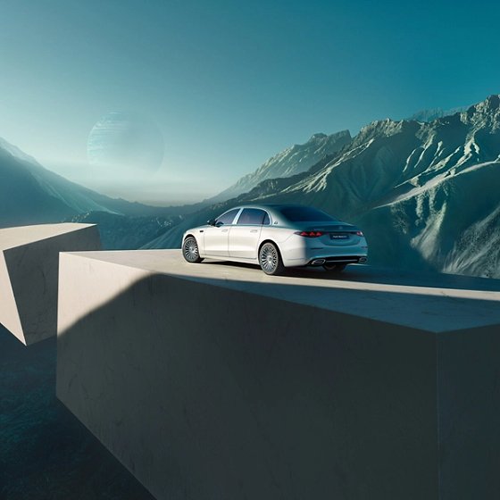 Mercedes-Benz Mercedes-Maybach S-Class, Rear three-quarter view in two-tone paint, with the Maybach lettering across the boot lid and the facelift tail-lamp signature.