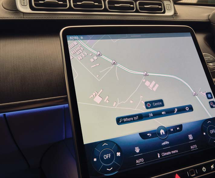 Mercedes-Benz Mercedes-Maybach S-Class — Central navigation display with live route guidance and hazard warnings via Car-to-X communication.