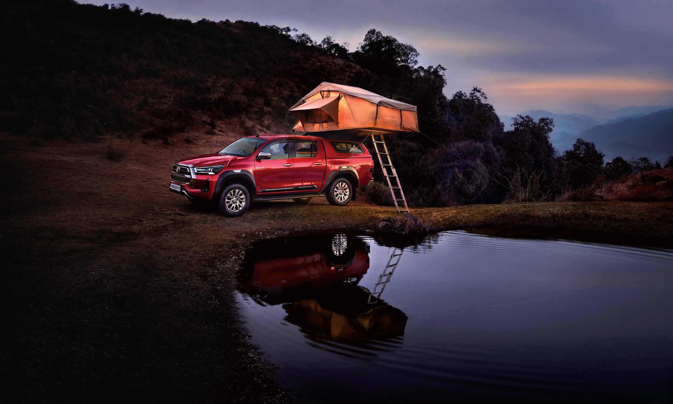 Toyota Hilux — Load bed sealed by a moulded hard deck cover over the pickup tub.